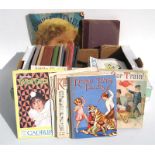 A box of early 20th century children's books.