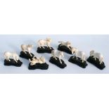 A group of late 19th / early 20th century Chinese ivory Mu horses on stands, each 4.5cm (1.75ins)