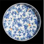 A Doucai porcelain peaches pattern shallow bowl, 27m (10.5ins) diameter.