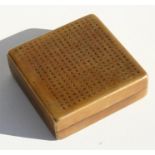 A Chinese bronze ink box, the top highly decorated with calligraphy, 12cm (4.75ins) square.