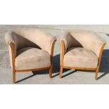 A pair of Edwardian fawn suede upholstered tub chairs (2).