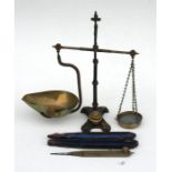 A pair of balance scales and weights: together with a cased brass compass.