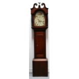 A 19th century oak and mahogany longcase clock, the painted arch dial with Roman numerals,