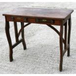 An oak side table with two short frieze drawers, 81cm (32ins) wide.