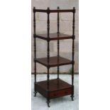 An early 19th century mahogany four-tier whatnot on turned supports, with drawer beneath, 47cm (8.
