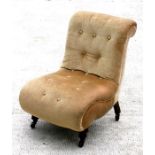 A late 19th century upholstered button back slipper chair, on turned front supports.