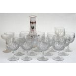 A set of twelve cut glass wine glasses, other glasses and a glass vase. Condition Report wine