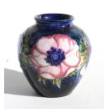 A Moorcroft 'Anenome' pattern vase, 10cm (4ins) high. Condition Report good overall condition with