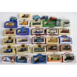 A large quantity of boxed and unboxed Lledo Diecast model cars with five collectors display