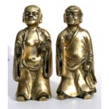 Two Chinese polished bronze models of musicians, 23cm (9ins) high.