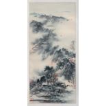 A Chinese scroll painting depicting a village river scene, in original box.