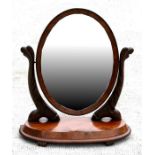 A Victorian mahogany toilet mirror.