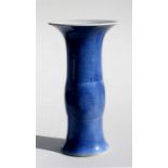 A Chinese powder blue glaze Gu vase, 24cm (9.5ins) high. Condition Report There is minor nibbling to