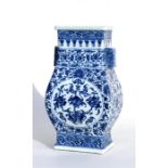 A Chinese blue and white vase, decorated with flowers and foliate scrolls, having a Qianlong seal