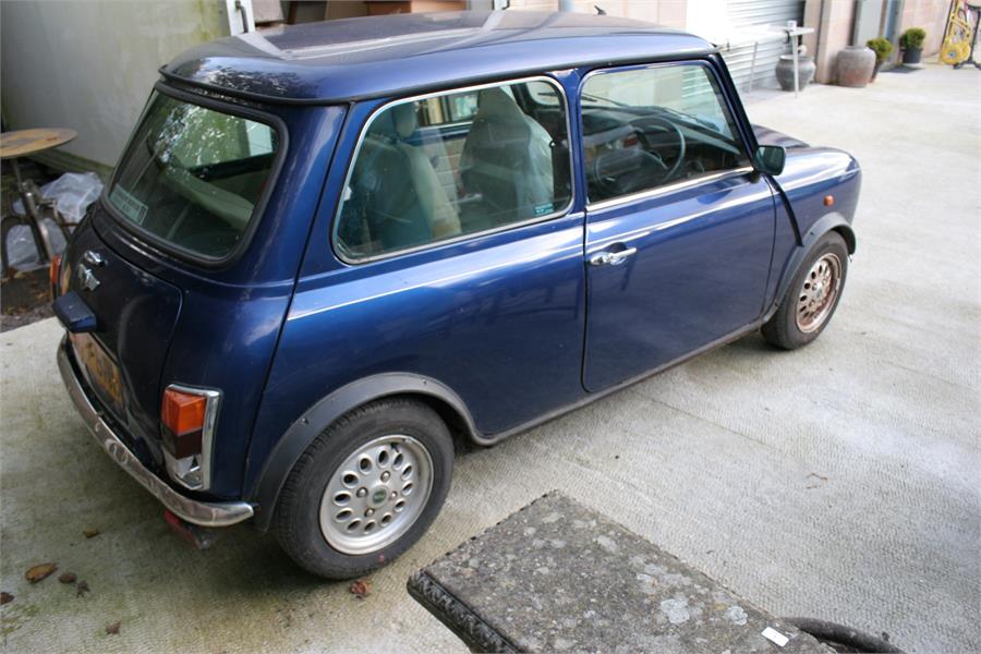 A 1997 Rover Mini 1.3i, registration P577 BRU, blue, one owner from new, 26182 mileage, fitted - Image 8 of 19