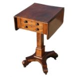 A Victorian mahogany work table, with two drop leaves, two drawers and two false drawers, on
