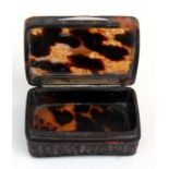 A 19th century Chinese tortoiseshell snuff box, the top carved with figural scenes, 6 by 4cm (2.