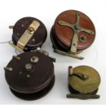 An early 20th century brass fishing reel, 6.5cm (2.5ins) diameter; an Allcock Aerialite Bakelite