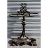 A cast iron double stick stand, 51cm (20ins) wide.