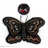 A Chinese needlework needle holder in the form of a butterfly, 22 by 13cm (8.5 by 5ins); together