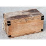 A rectangular pine trunk with rope carry handles, 69cm (26ins) wide.
