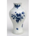 A Worcester First Period vase, decorated with flowers and butterflies, 18cm (7ins) high. Condition