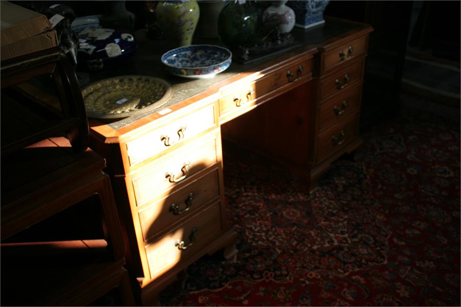 A reproduction yew wood pedestal partners desk, with green leather inset top above a combination - Image 8 of 10