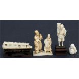 A group of late 19th / early 20th century Oriental ivory carvings, including figures and a