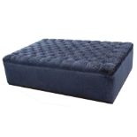 A large modern button upholstered foot stool, 150cm (59ins) wide.
