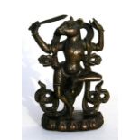 A Tibetian bronze rat deity, 13cm (5ins) high.