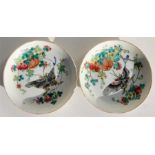 A pair of Chinese Canton Export shallow bowls, decorated with butterflies and fruit in enamel