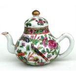 A late 19th century Chinese famille rose miniature teapot, the decoration of birds, flowers and