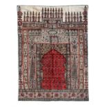 A 19th century Indo-Persian block printed summer prayer rug, with caligraphy panel above the mihrab,