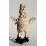 A large late 19th / early 20th century Chinese ivory two-handled tripod censer on stand, the pierced