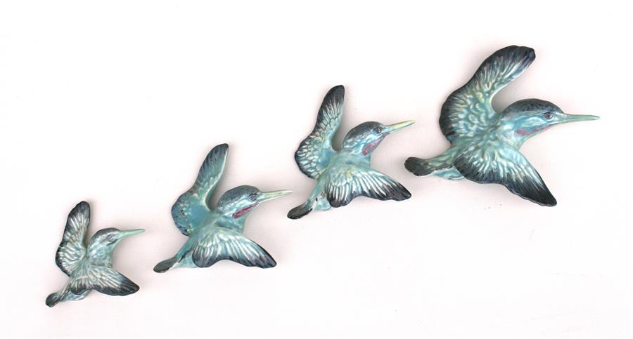 A set of four Beswick graduated kingfisher wall plaques, Condition Report largest and smallest birds