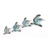 A set of four Beswick graduated kingfisher wall plaques, Condition Report largest and smallest birds