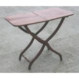A Victorian mahogany folding coaching table with shaped legs and turned stretcher, 89cm (35ins)