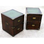 A pair of Campaign style two-drawer bedside cabinets, 41cm (16ins) wide.