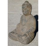 An 18th century Chinese Northern Wei style (qing dynasty) carved stone Buddha seated in