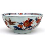A Chinese Imari bowl decorated with flowers, 27cm (10.5ins) wide. Condition Report extensively