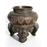 A 19th century Chinese bronze censer on tripod stand, 19cm (7.5ins) high.