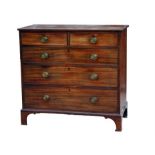 An early 19th century mahogany chest of two short and three long graduated drawers, standing on
