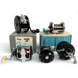 Five vintage Penn Multiplier fishing reels to include a No. 26, a No. 85, a Squidder No.140, a No.