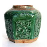 A Chinese Ming Dynasty green glazed vase, decorated with birds, flowers and calligraphy in panels,