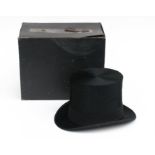A Dunn & Co. silk top hat in original box. Condition Report very good overall condition