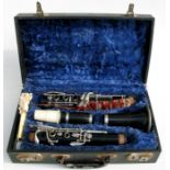 A Buisson model 100 clarinet in case.