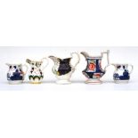 Five Victorian Gaudy Welsh Pottery jugs (5).
