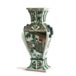 A 19th century Chinese famille rose square section vase, decorated with figures and prunus, six