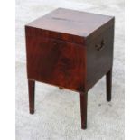 An early 19th century figured mahogany cellarette on square tapering legs (lacks interior), 41cm (