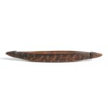 Ethnographic - a tribal canoe shaped food bowl with simple chip carved decoration, 80cm (31.5ins)